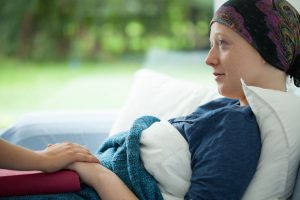 Cancer Woman Lying In Bed
