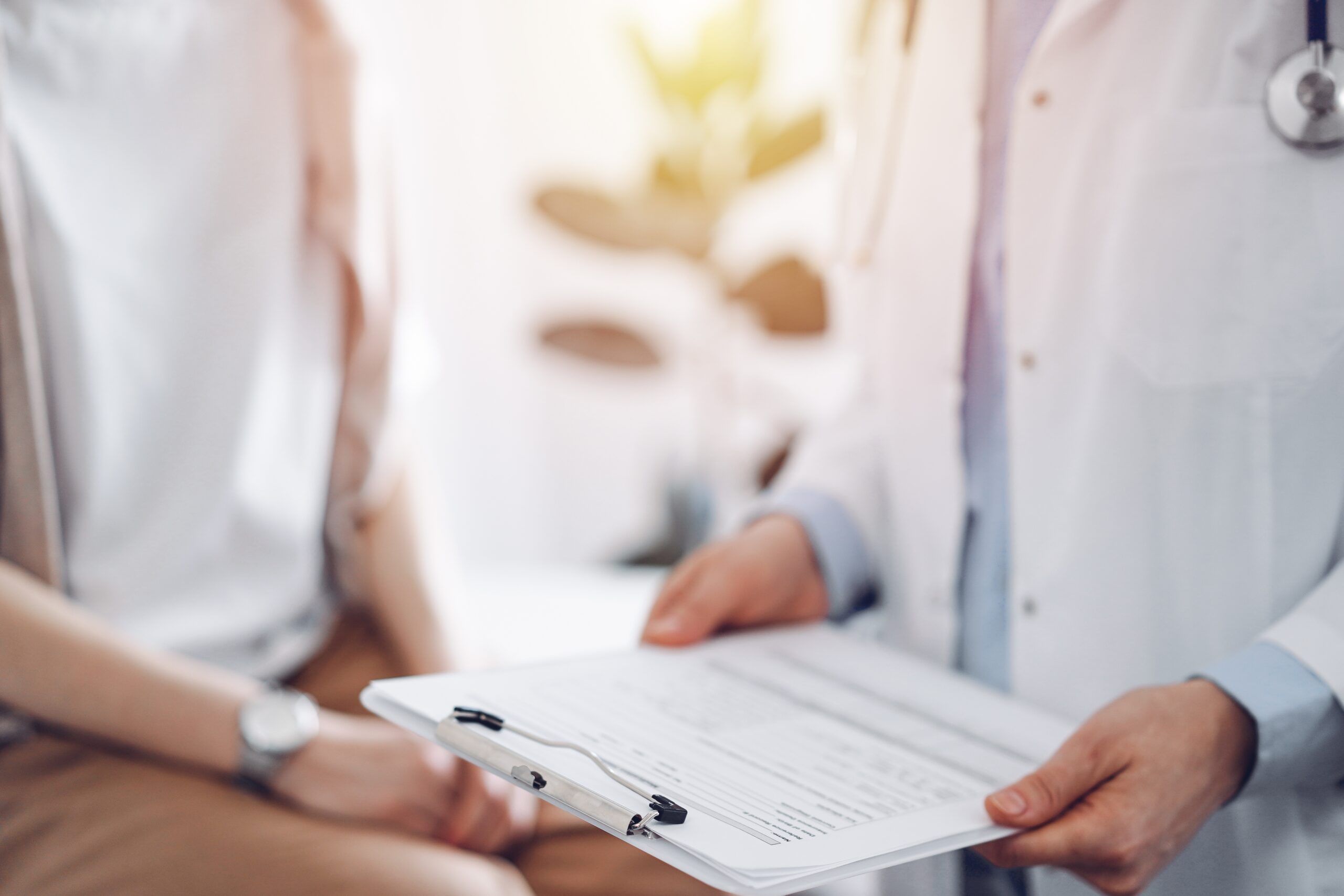 Doctor,And,Patient,Discussing,Perfect,Health,Exam,Results.,Friendly,Physician Docs surgery scaled | ApconiX