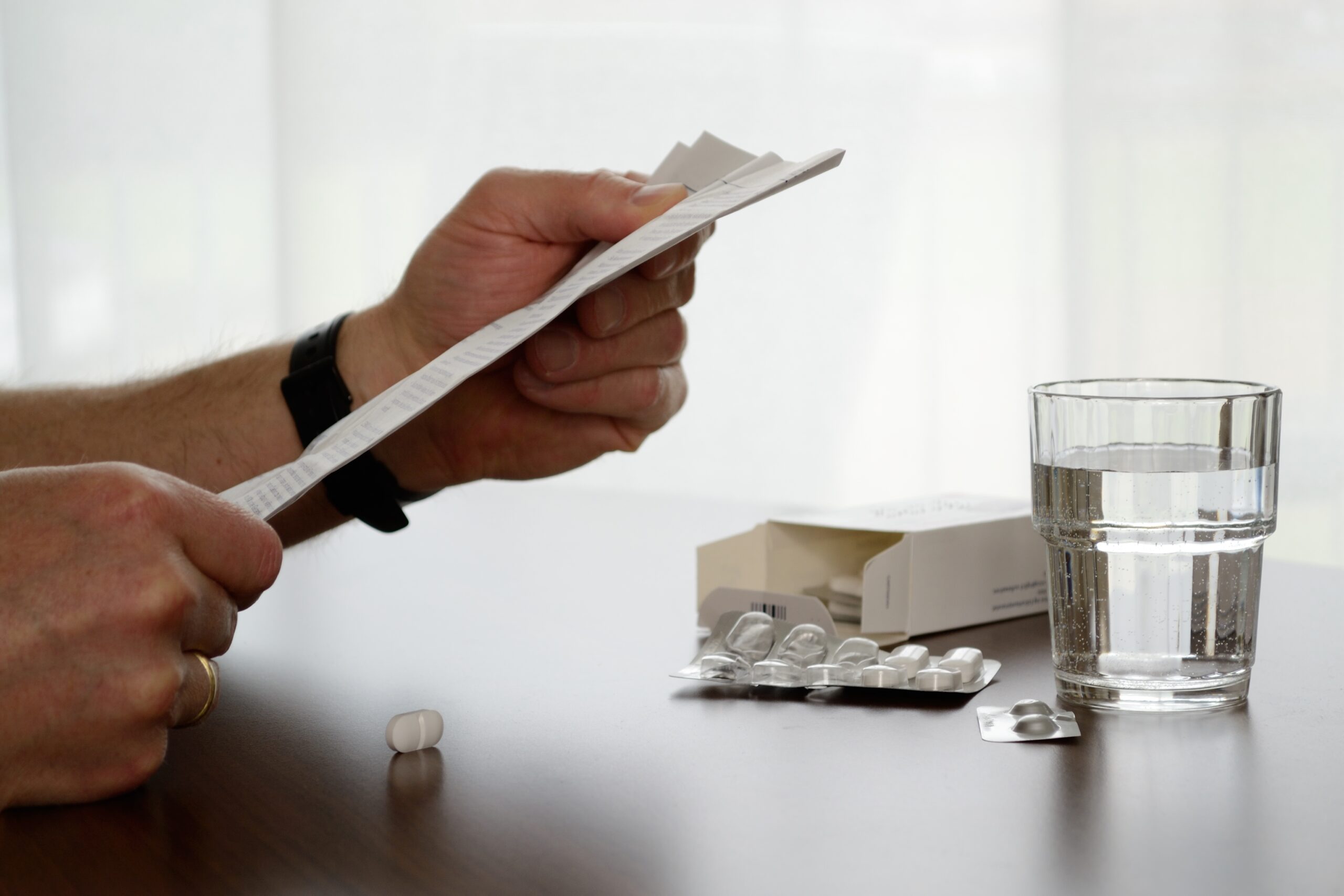 Person,Reading,Patient,Instruction,Leaflet,At,The,Tablets,And,Glass safety leaflet scaled | ApconiX